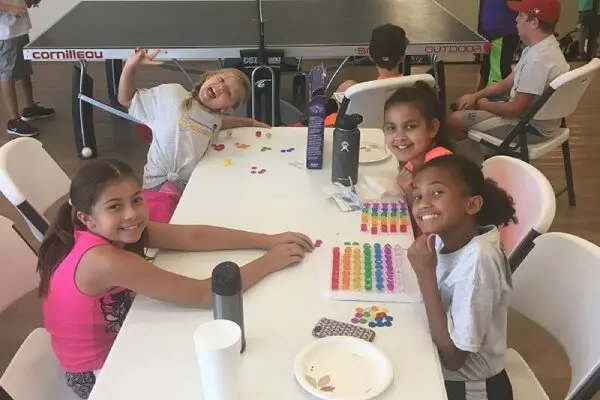 A group of kids doing arts and crafts