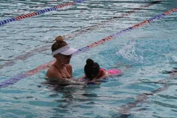 young girl in a swimming lesson